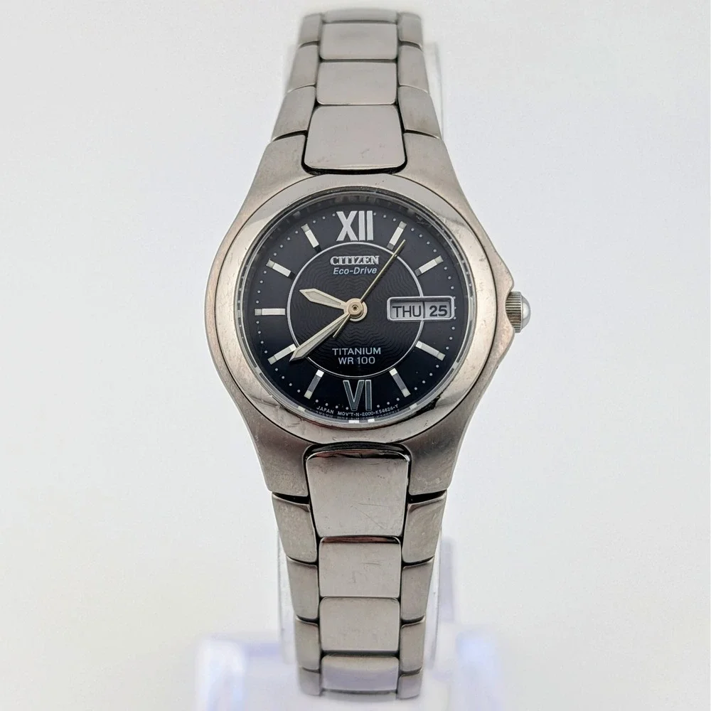 Citizen Eco-Drive Titanium E001-K18451 Women's WR100 Day Date Black Dial Watch